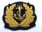 Preview: Deutsche Marine Offizier Mützenabzeichen Goldener Anker dreiteilig 1960 Stoff (11468)