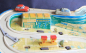 Preview: Technofix Rallye Plastikbahn mit Tankstelle und Fahrzeugen Friktionsantrieb 1965 (1720)