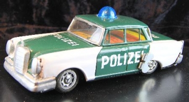 Taiyo Mercedes-Benz 190 Police 1965  Tinmodel with Frictiondrive (2066)