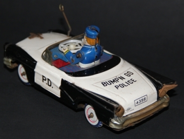 Yoshiya Chevrolet "Bump'n go Police-Car" 1963 Tinmodel with Frictiondrive (5150)