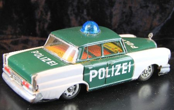 Taiyo Mercedes-Benz 190 Police 1965  Tinmodel with Frictiondrive (2066)