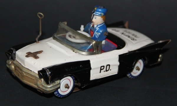 Yoshiya Chevrolet "Bump'n go Police-Car" 1963 Tinmodel with Frictiondrive (5150)
